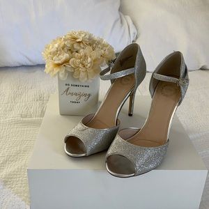 Open toe silver heels. Size 9